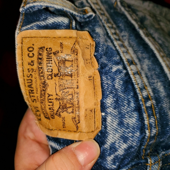 Vintage late 1980s early 1990s acid wash orange tab Levi's 14 slim